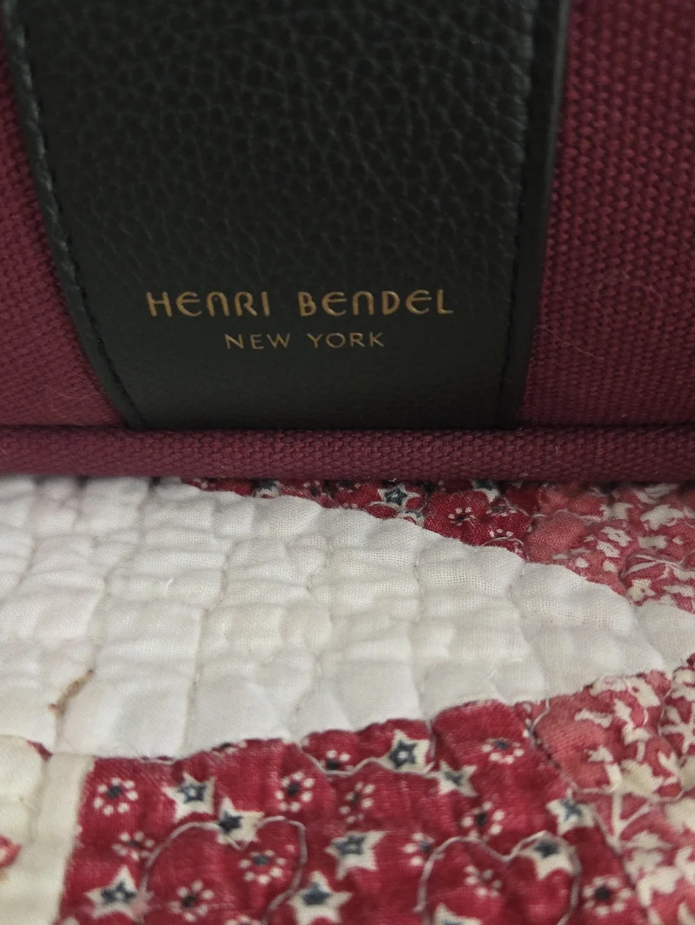 henri bendel Burgundy Canvas Backpack with Black Trim and Striped Strap
